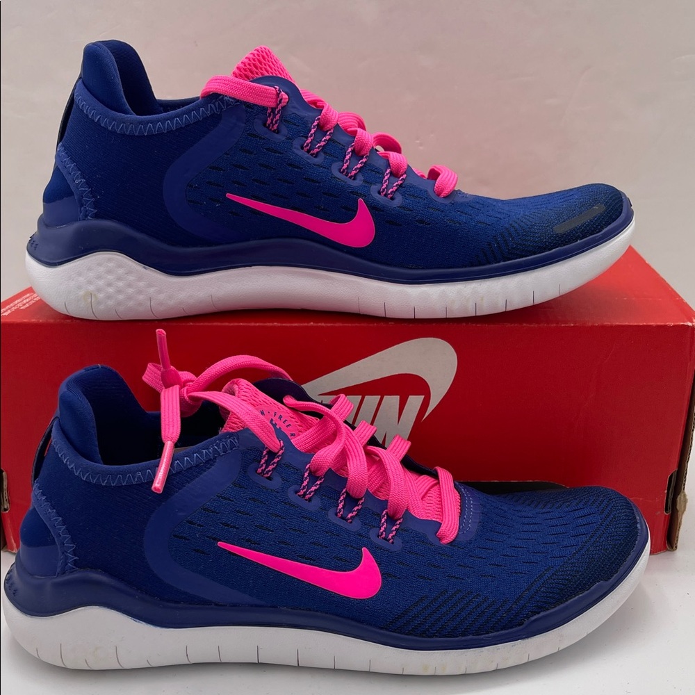 Nike WMNS Sneakers in Blue with Pink Accents NIKE FREE RUN
942837 403